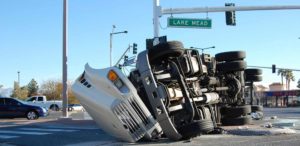 Truck Roll Over accident in Las Vegas on Lake Mead BLVD. Police on scene. Victim collecting evidence for Las Vegas truck accident lawyer.