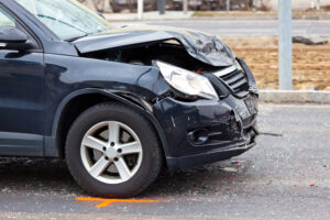 A body damage after a car accident. Damage for insurance and may have caused severe injuries