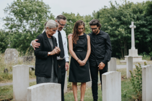 a family at a gravesite that will file a wrongful death claim and personal injury claim