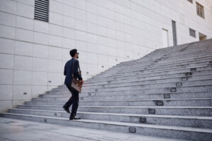 a man walking up the stairs